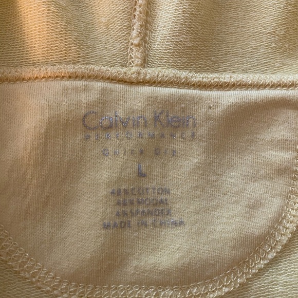 Calvin Klein yellow hoodie, size Large.  V-neck with a satin ribbon tie. - Picture 4 of 5